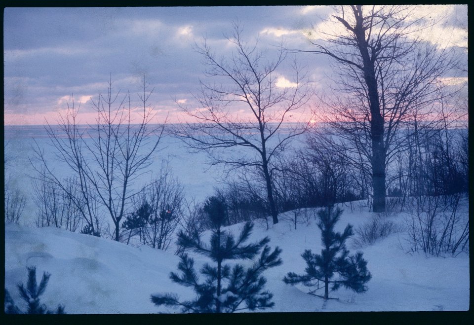 Sunset over the snow and ice 1976